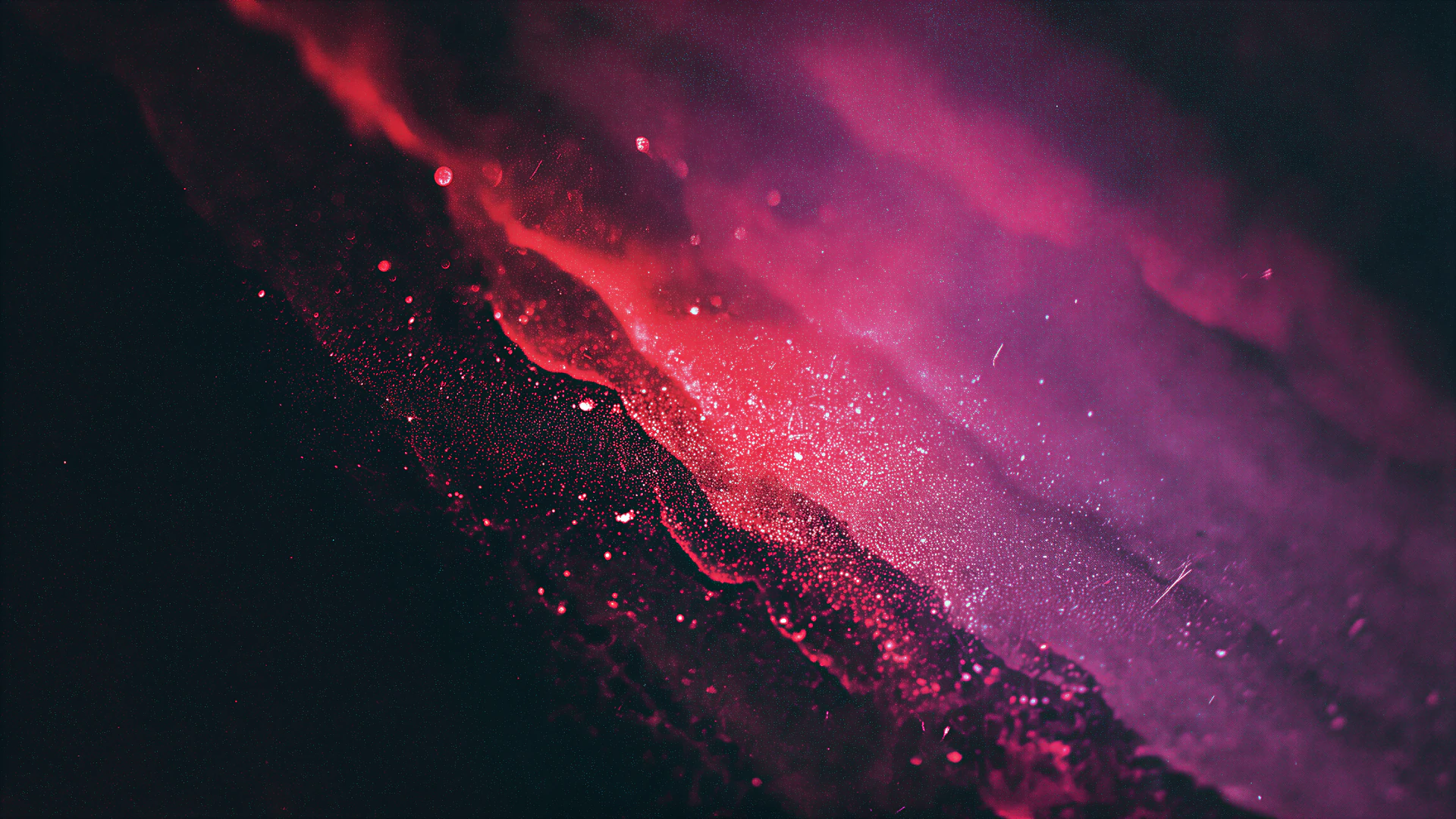 A dark abstract wave of crimson and magenta tears across a grainy digital void. VHS haze, liquid texture, and scattered particles create a vivid cinematic glow.